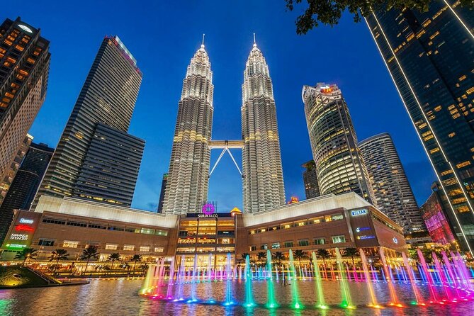 From Singapore: Private Kuala Lumpur / Malacca tour + SKY DINING - National Monument and Central Market: KL’s story in bronze and architecture