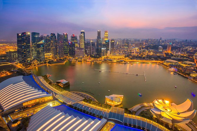Lion City Night Out + Roundtrip Transfers - Clarke Quay and Bumboats: The Singapore River Skyline Cruise