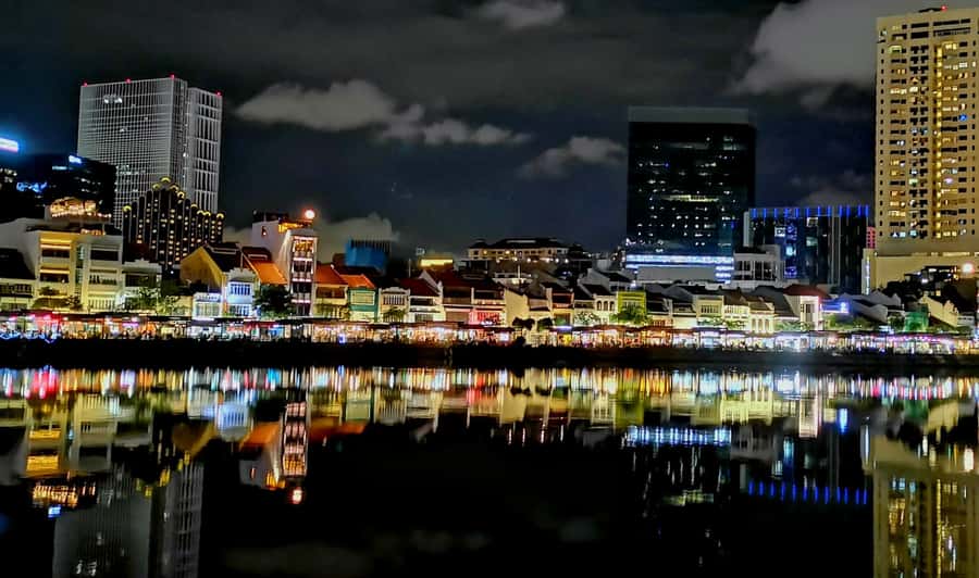 Secrets of Singapore Kick Scooter Tour with Dinner - Clarke Quay and Boat Quay: Three Quays, One Night Rhythm