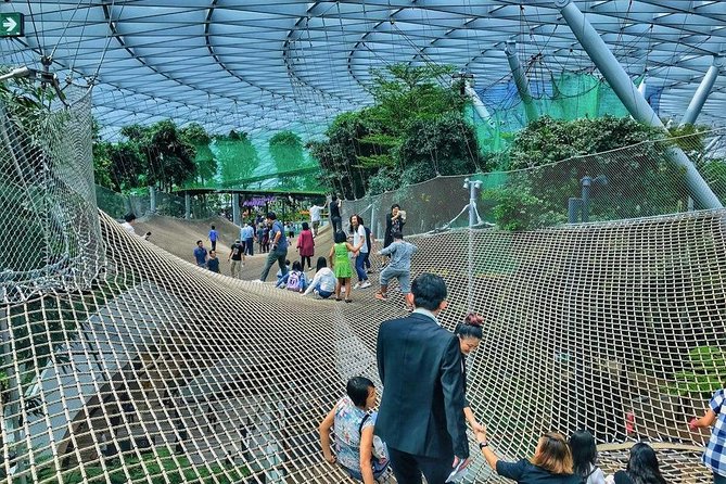 Singapore Changi Jewel Highlights Walking Tour - Stop 1: Jewel Changi Airport and the dome-and-waterfall backstory